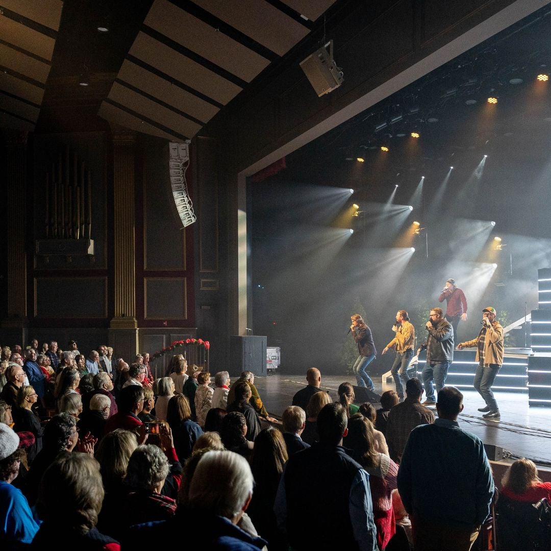 a crowd watching a show on stage